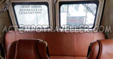 14 seater tempo traveller with sofa cum bed