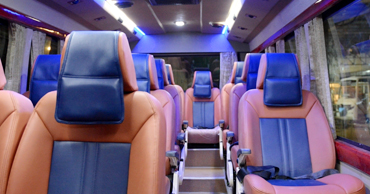 15 seater tempo traveller with sofa cum bed