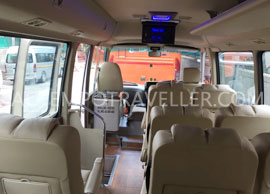 toyota coaster modified big modified seating mini coach rental in delhi